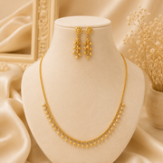 Swarna - Gold replica with earrings