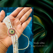 PEARL CHOKER WITH FLORAL MEDALLION