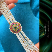 PEARL CHOKER WITH FLORAL MEDALLION